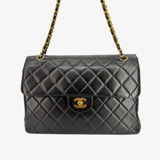 RG338 - CHANEL Vintage Black Lambskin Double Side Jumbo Flap Bag