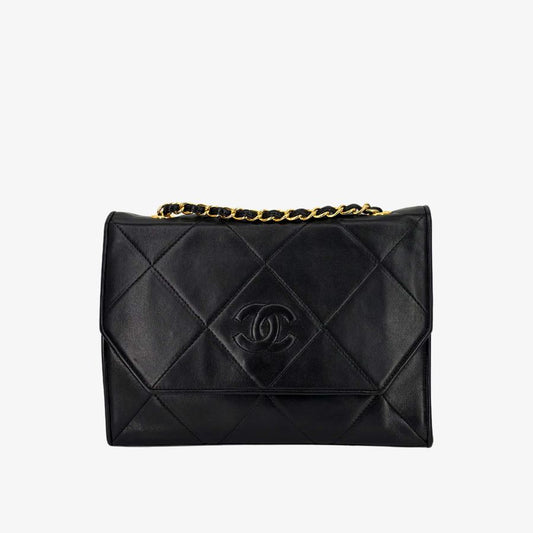 RG410 - CHANEL Vintage Black Lambskin Quilted Flap Bag