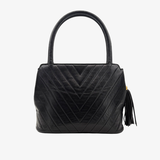 RG432 - CHANEL Vintage Black Lambskin Chevron Handbag