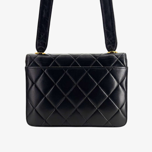 RG589 - CHANEL Vintage Black Lambskin Flap Bag
