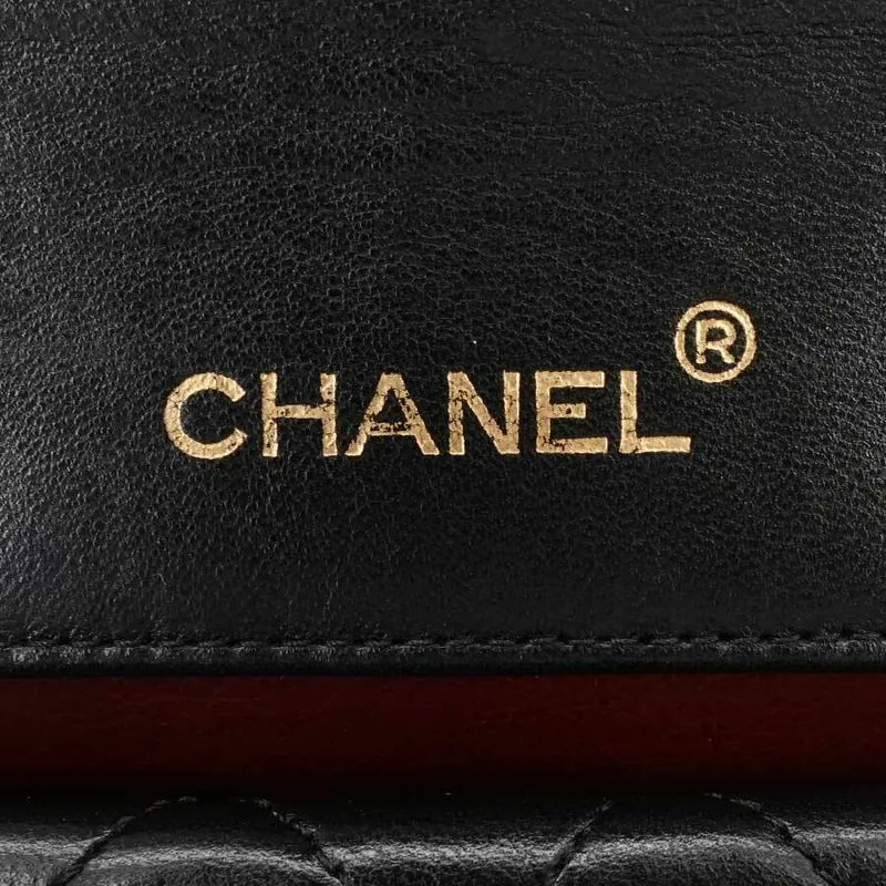 jr928-chanel-vintage-black-lambskin-trapezoid-flap-bag