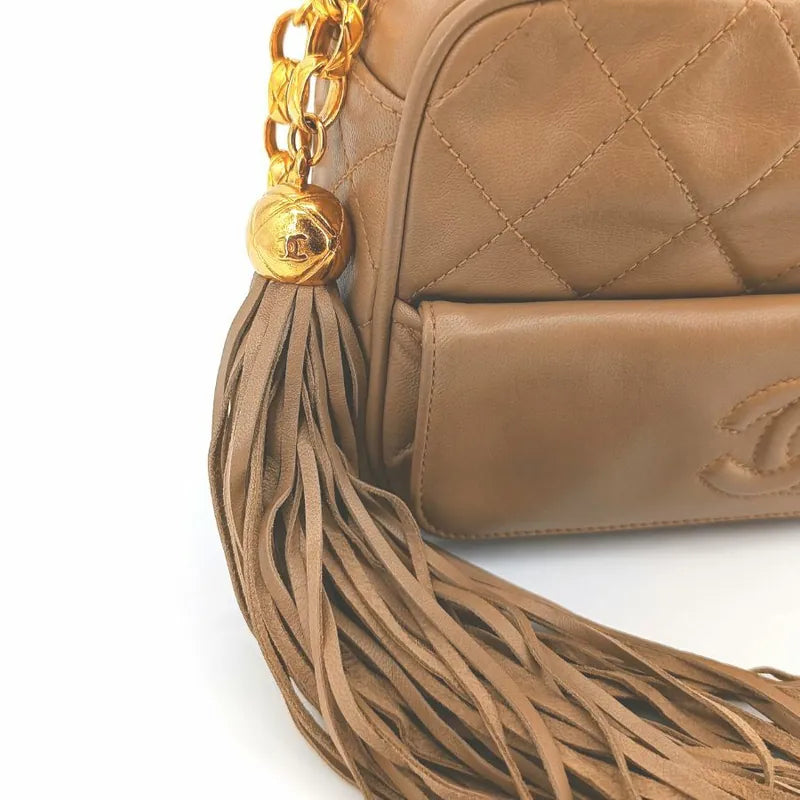 ra234-chanel-vintage-beige-lambskin-tassels-gold-chain-camera-bag