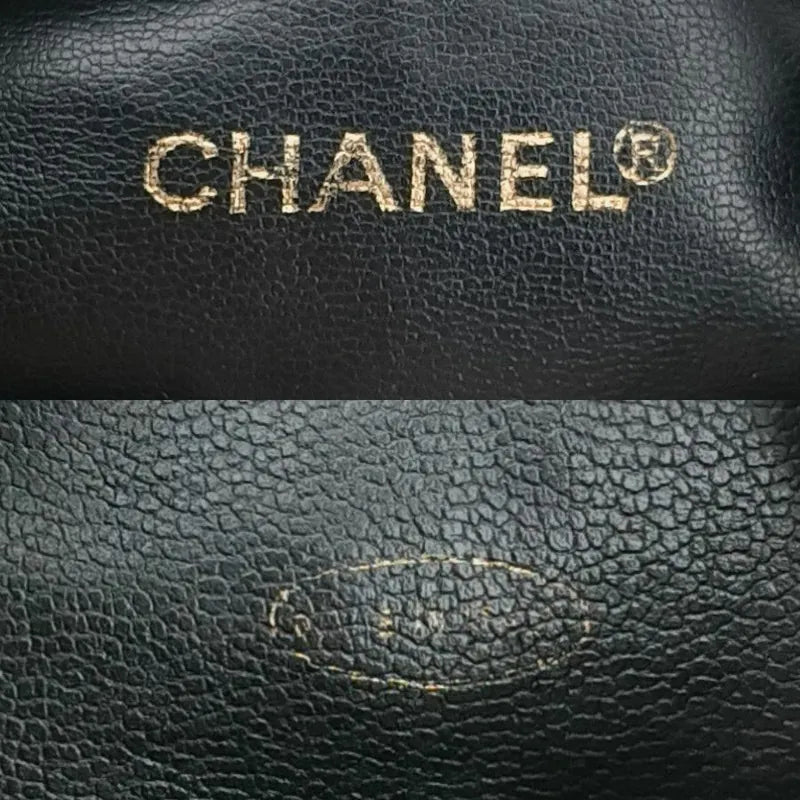 ju660-chanel-vintage-black-lambskin-bucket-bag