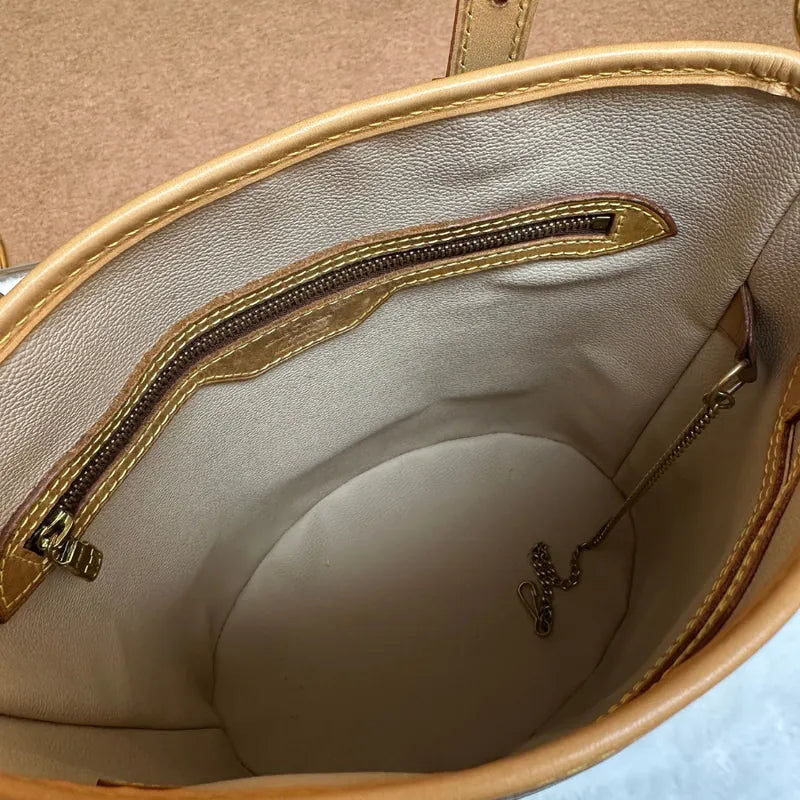 jw201-louis-vuitton-vintage-petite-monogram-bucket-bagrepaired-item