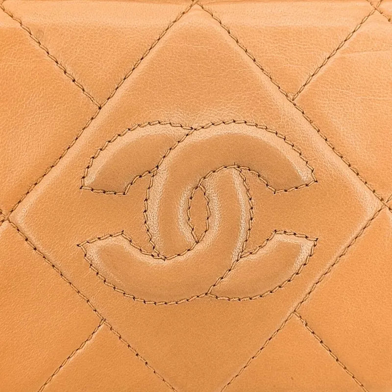 jt079-chanel-vintage-beige-lambskin-tassel-camera-bag