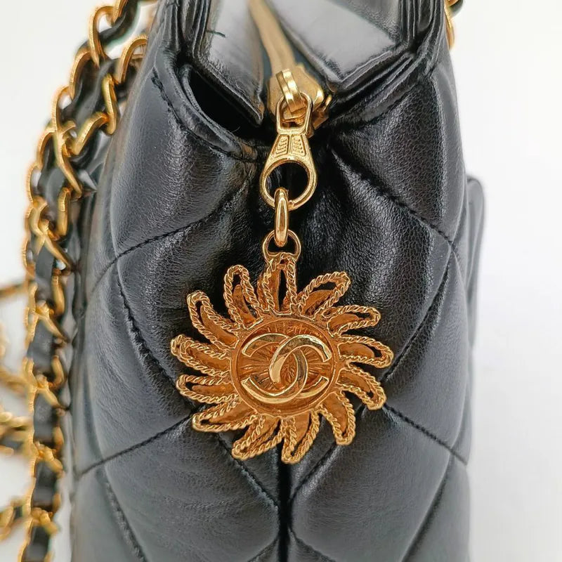 rb197-chanel-vintage-black-lambskin-sun-flower-charm-tote-bag