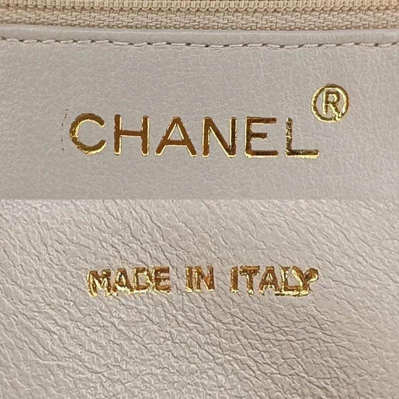 jt657-chanel-vintage-beige-lambskin-gold-chain-camera-bag