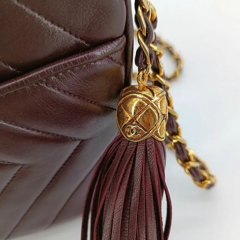 jt296-chanel-vintage-burgundy-lambskin-tassel-camera-bag