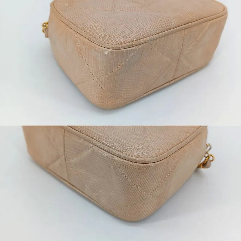 ra048-chanel-vintage-pink-lizard-skin-tassel-camera-bag