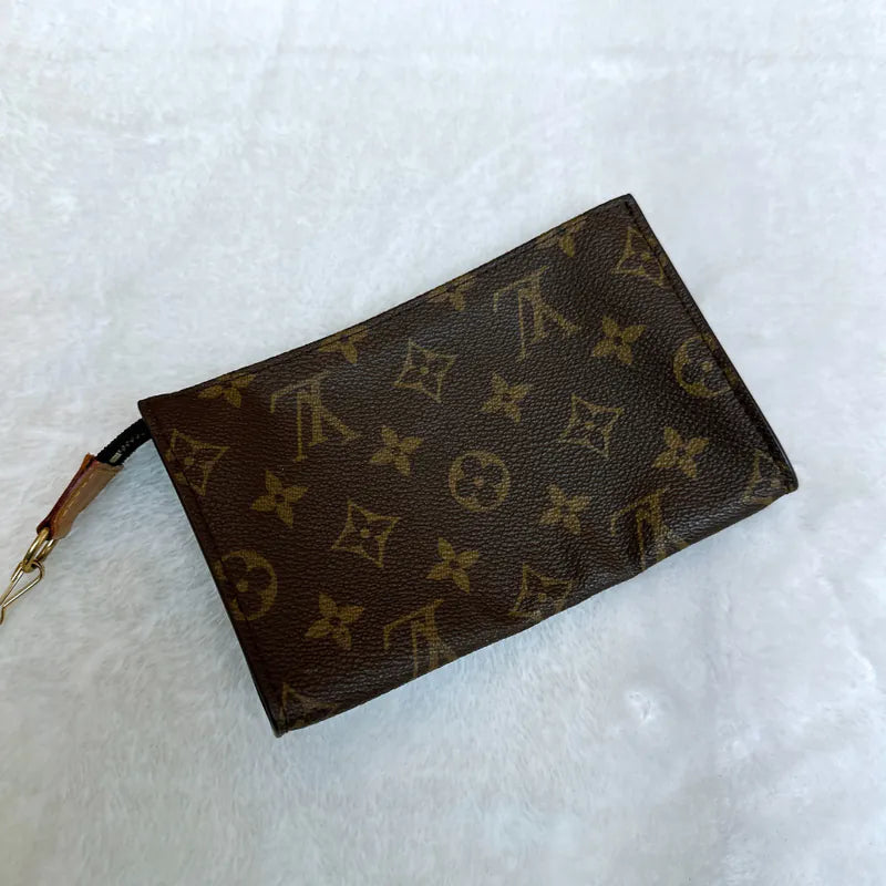 jw236-louis-vuitton-vintage-petite-monogram-bucket-bagrepaired-item