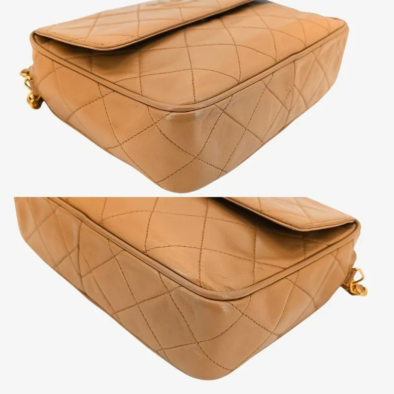 jt079-chanel-vintage-beige-lambskin-tassel-camera-bag