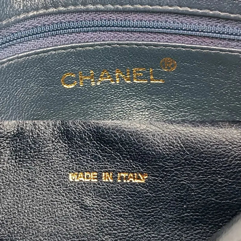 js491-chanel-vintage-black-lambskin-quilted-tassels-camera-bag