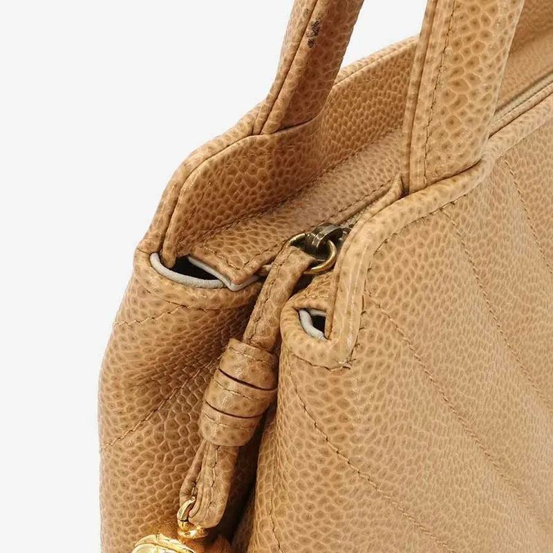 jr876-chanel-vintage-beige-caviar-leather-handbag