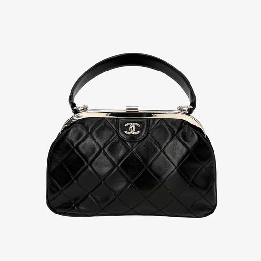 RC329 - CHANEL Vintage Black Lambskin Quilted Kisslock Handbag
