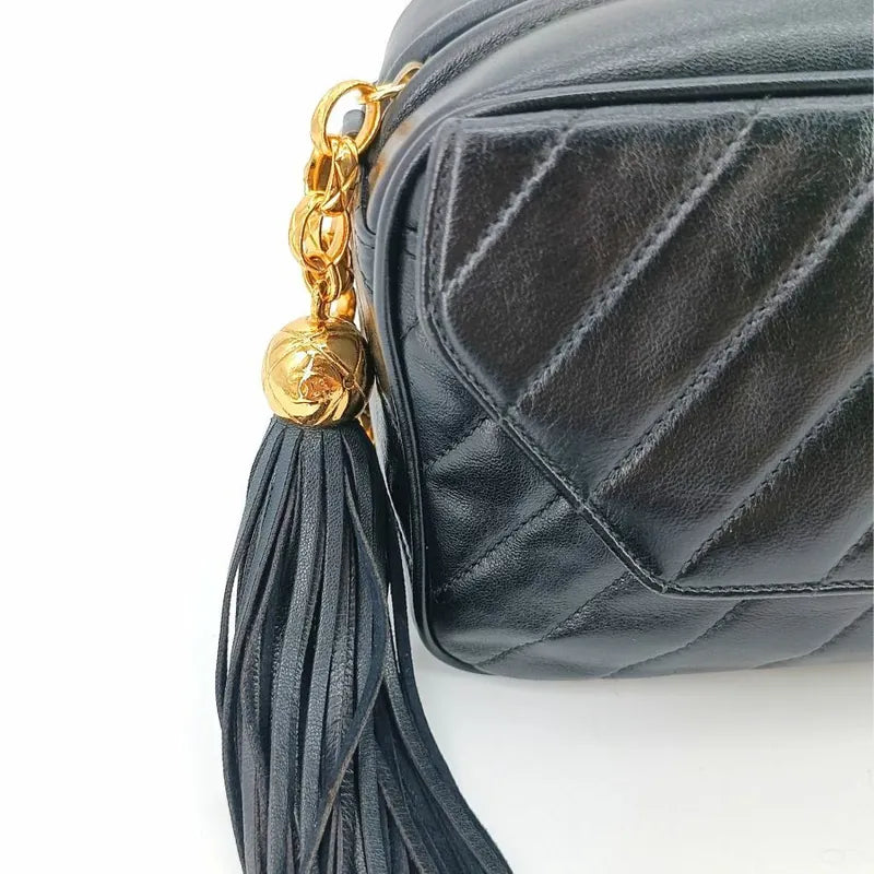 ra067-chanel-vintage-black-lambskin-tassels-gold-chain-camera-bag