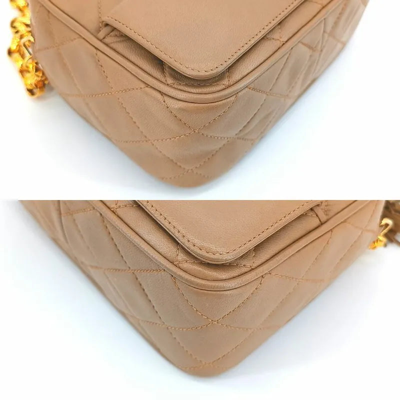 ra234-chanel-vintage-beige-lambskin-tassels-gold-chain-camera-bag