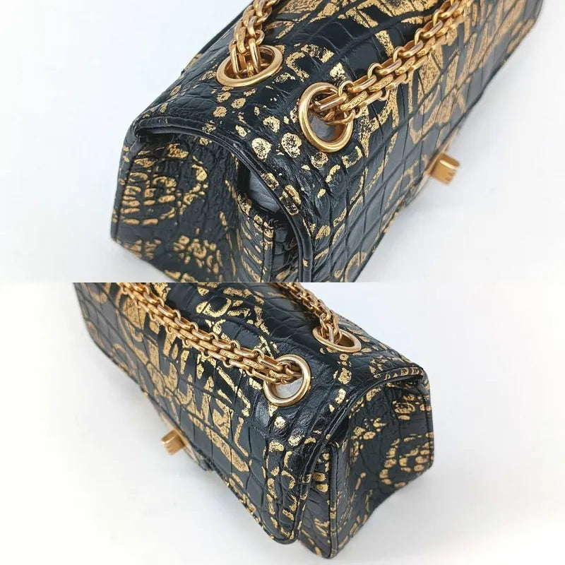 90190312-chanel-black-and-gold-graffiti-calfskin-crocodile-embossed-255-flap-bag