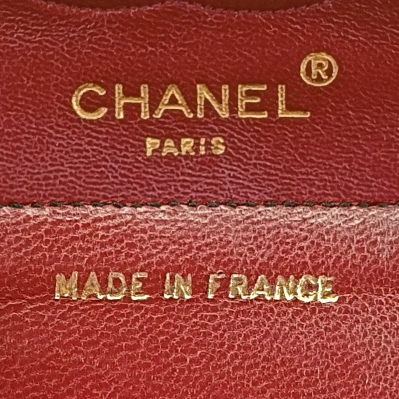c446-chanel-vintage-black-lambskin-quilted-flap-bag