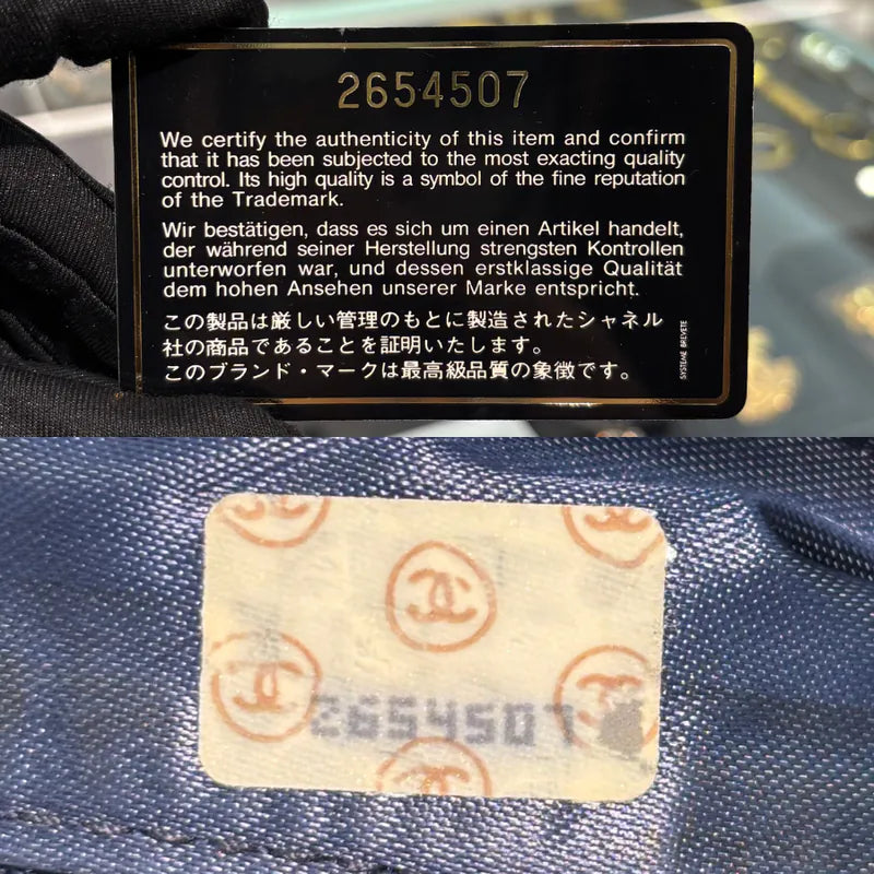 rc584-chanel-vintage-navy-lambskin-gold-chain-camera-bag