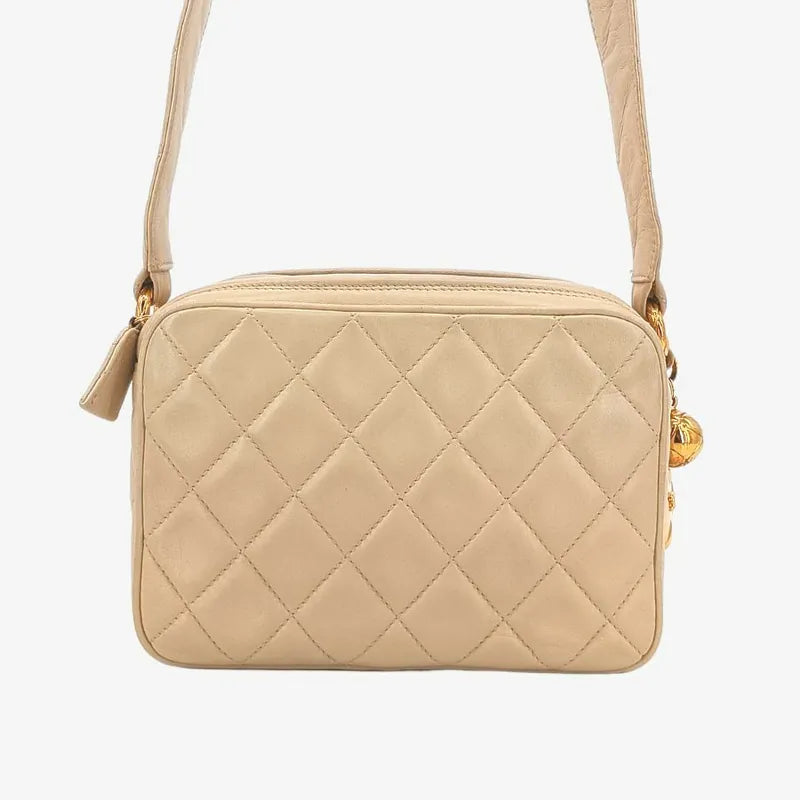jt051-chanel-vintage-beige-lambskin-quilted-camera-bag