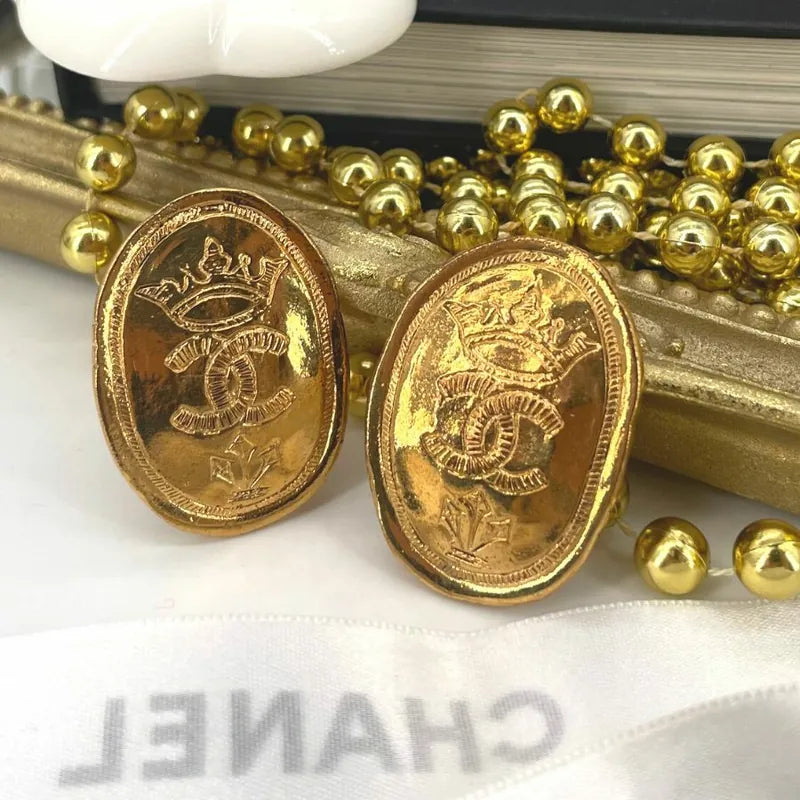 jt235-chanel-vintage-oval-cc-crown-gold-plated-clip-on-earrings