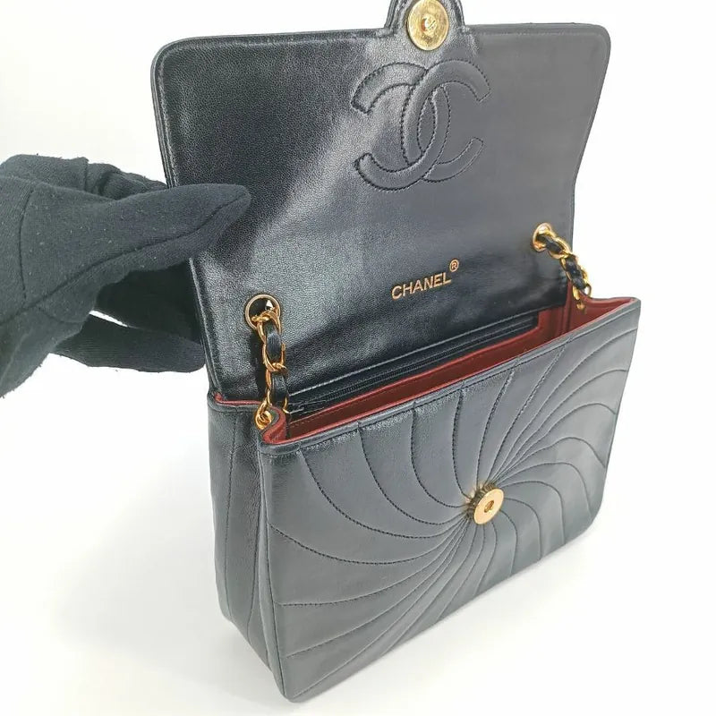 jt341-chanel-vingate-black-lambskin-spiral-flap-bag
