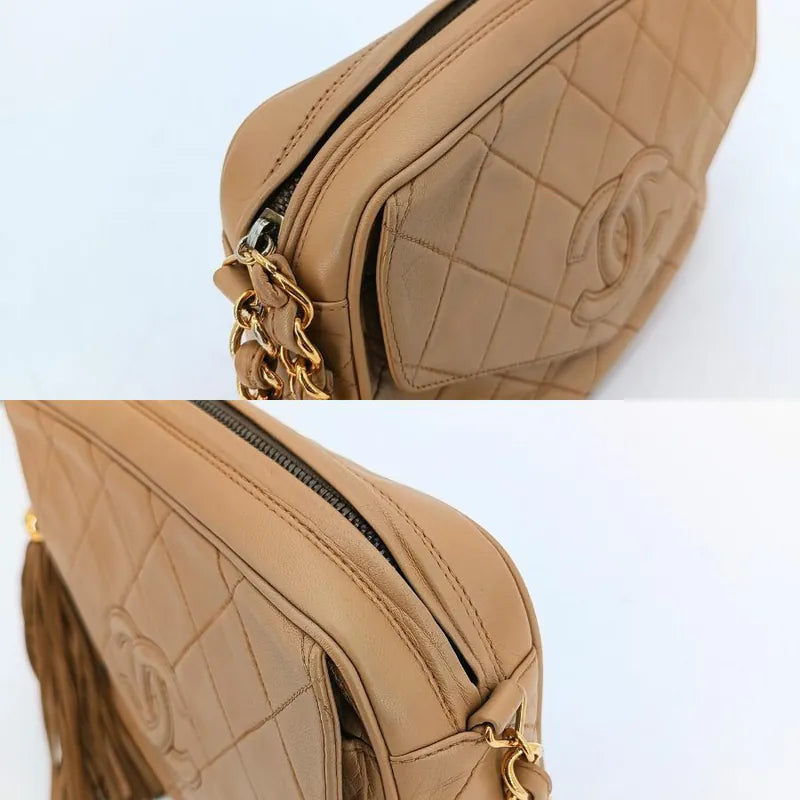 ju350-chanel-vintage-beige-lambskin-tassel-camera-bag
