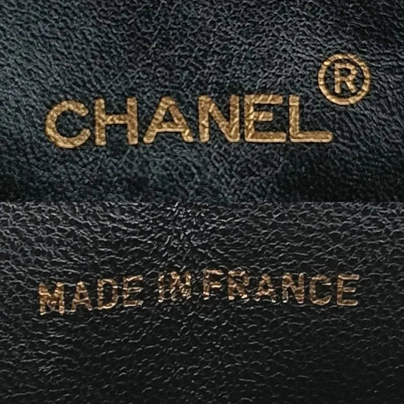 jt616-chanel-vintage-black-lambskin-quilted-camera-bag
