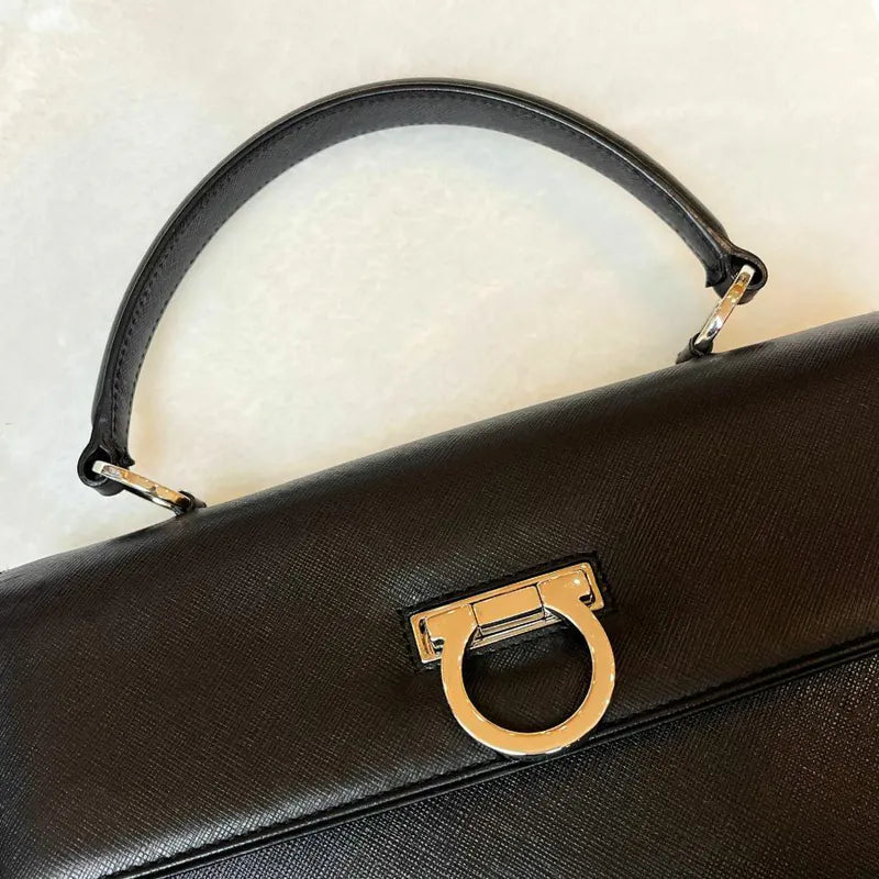 jx305-salvatore-ferragamo-vintage-black-leather-gancini-hand-bag