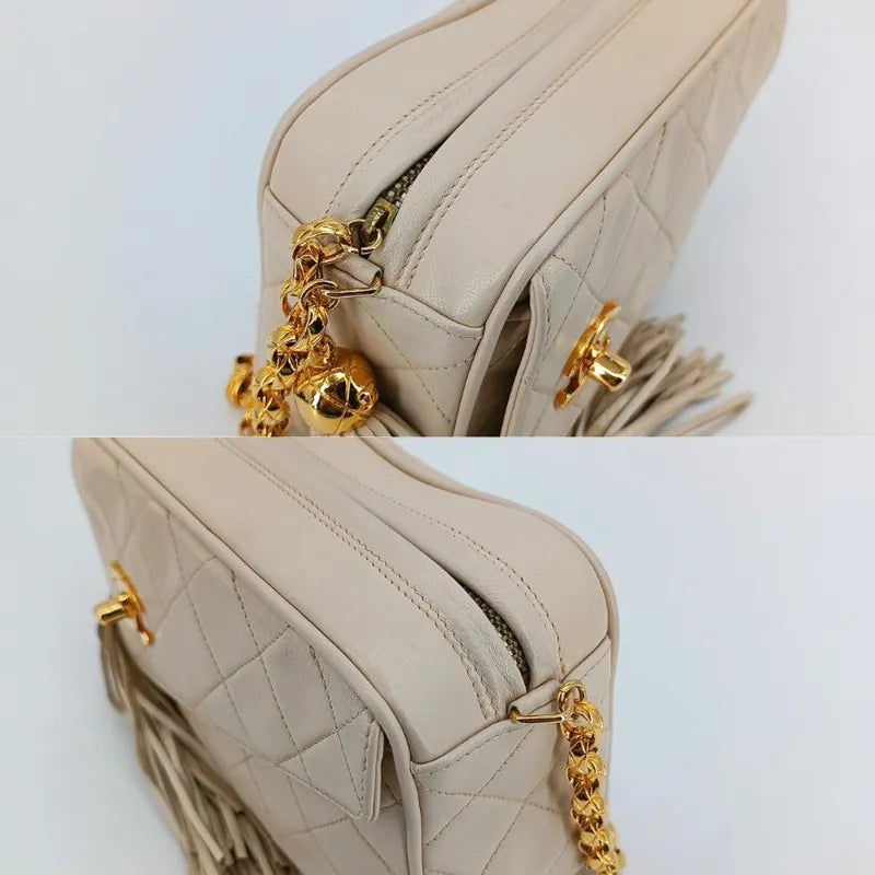 jt657-chanel-vintage-beige-lambskin-gold-chain-camera-bag