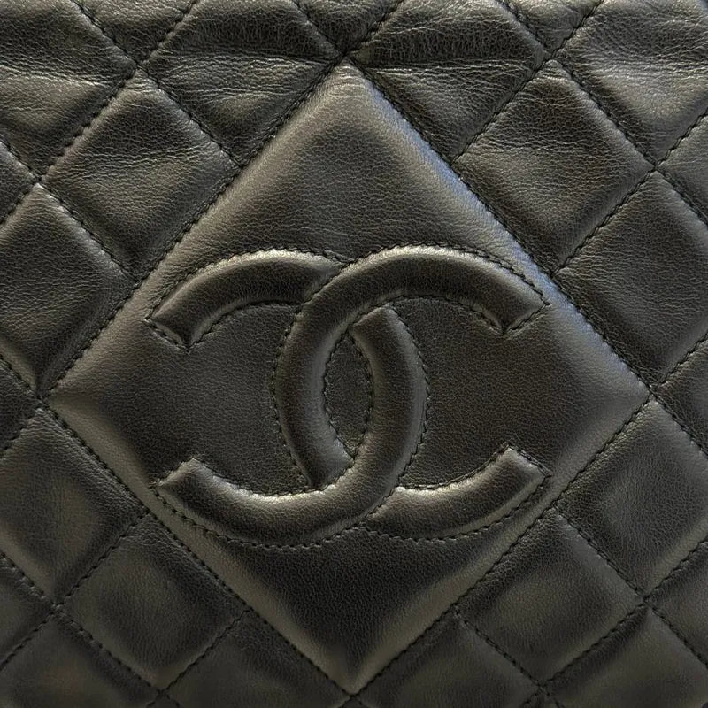 jw393-chanel-vintage-black-lambskin-tassel-camera-bag