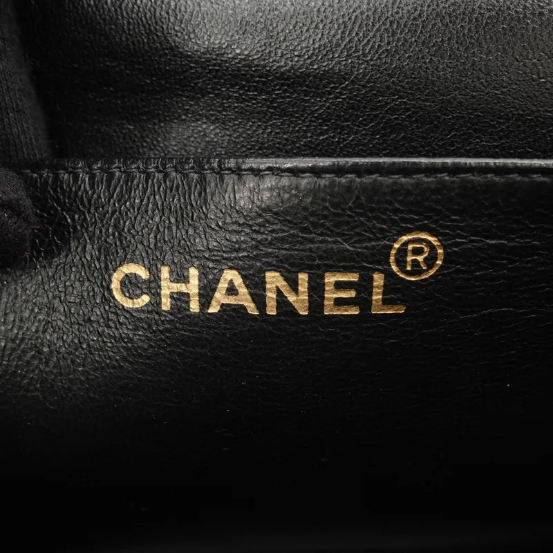 jq614-chanel-vintage-black-caviar-quilted-handbag