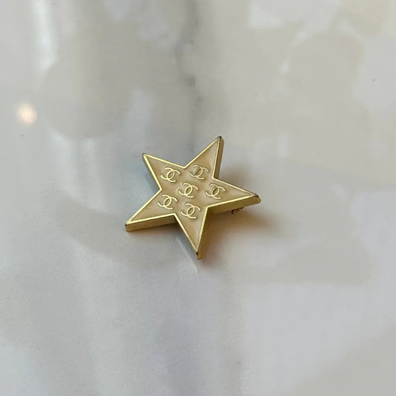rc512-chanel-coco-mark-star-brooch