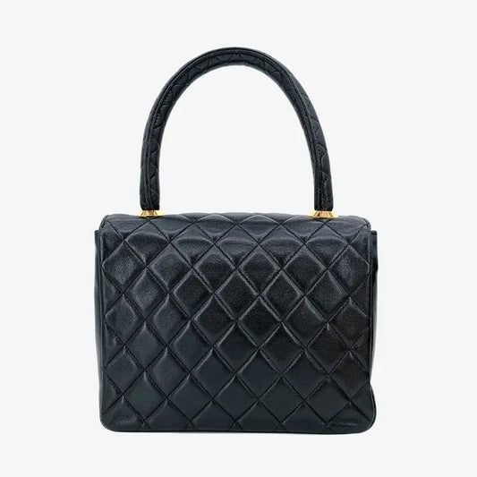 90185806-chanel-vintage-black-lambskin-quilted-top-handbag