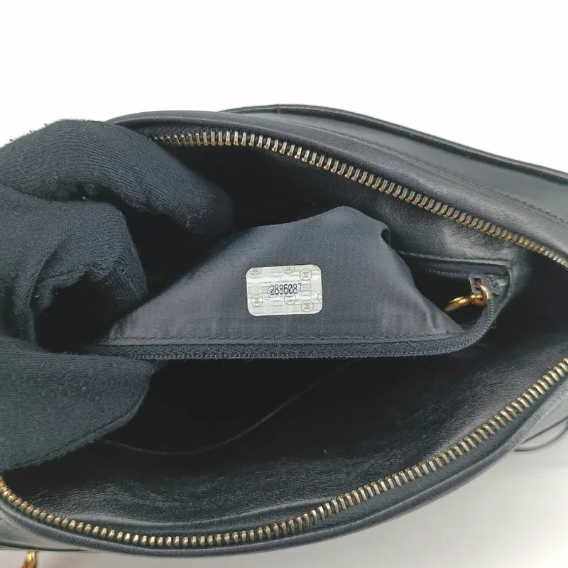 c354-chanel-vintage-black-lambskin-tassel-camera-bag