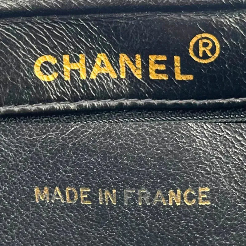 jah186-chanel-vintage-black-lambskin-quilted-camera-bag
