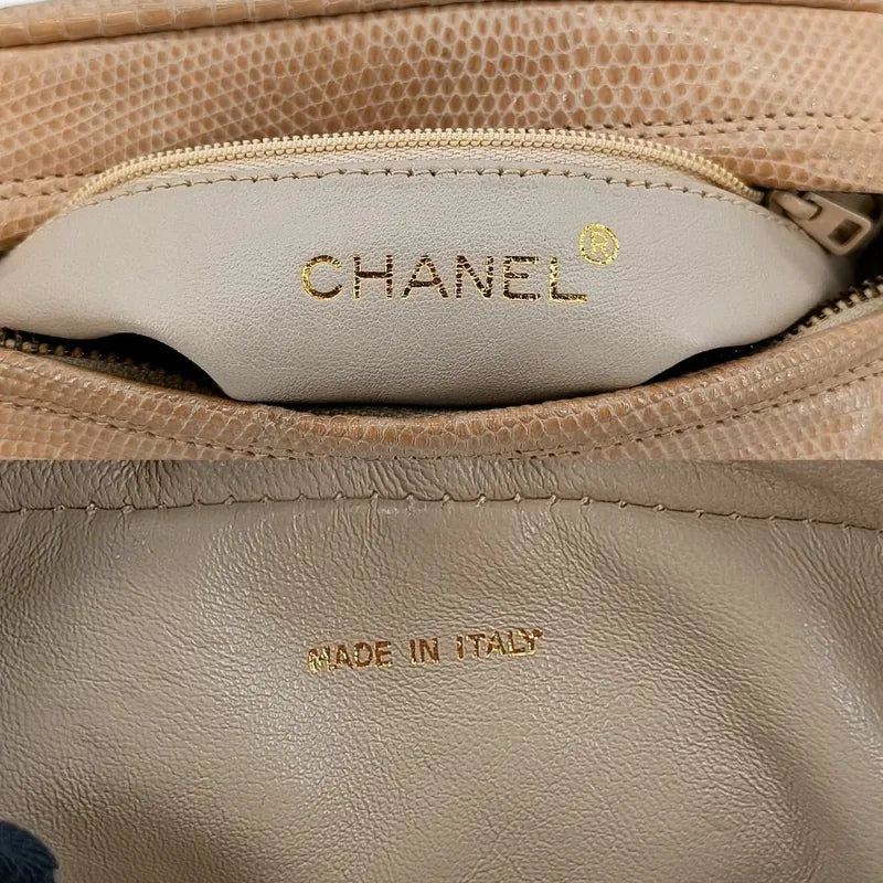 ra048-chanel-vintage-pink-lizard-skin-tassel-camera-bag