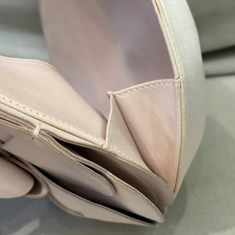 c531-chanel-vintage-pale-pink-calfskin-camellia-wristlet-evening-bag