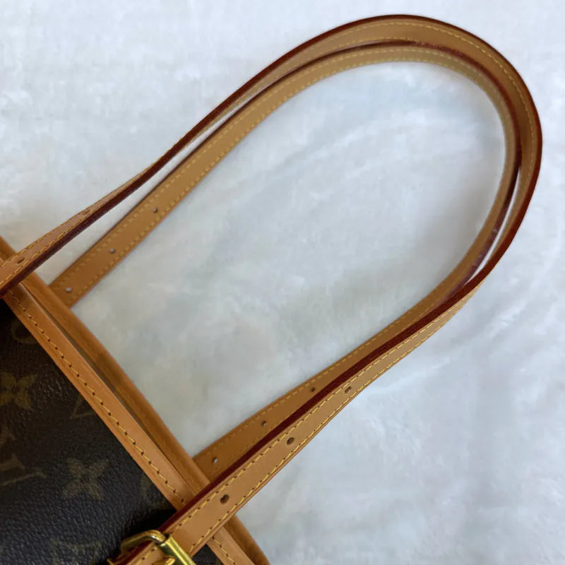 jw201-louis-vuitton-vintage-petite-monogram-bucket-bagrepaired-item