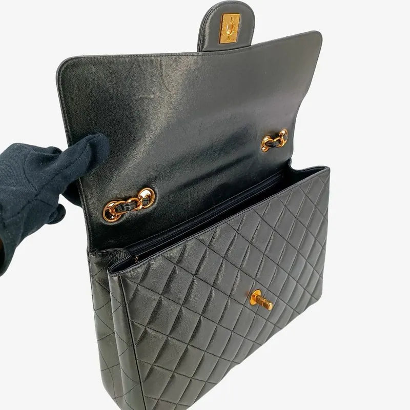 c337-chanel-vintage-black-lambskin-jumbo-classic-flap-bag