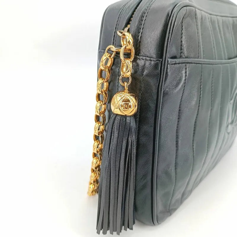 c369-chanel-vintage-black-lambskin-tassels-gold-chain-camera-bag