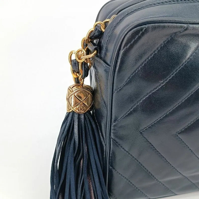 jt267-chanel-vintage-navy-lambskin-tassel-camera-bag