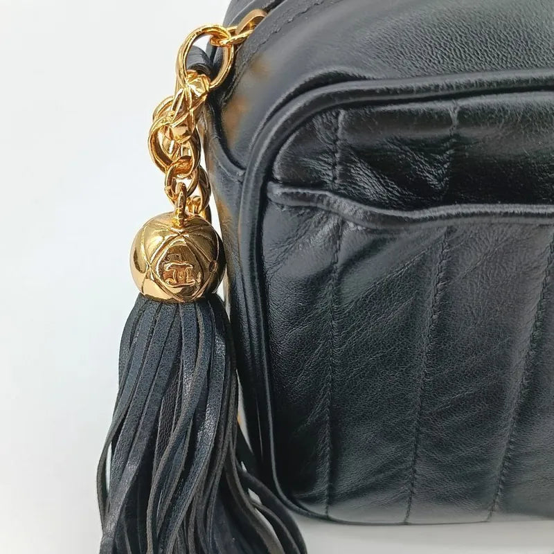 jt179-chanel-vintage-black-lambskin-tassels-gold-chain-camera-bag