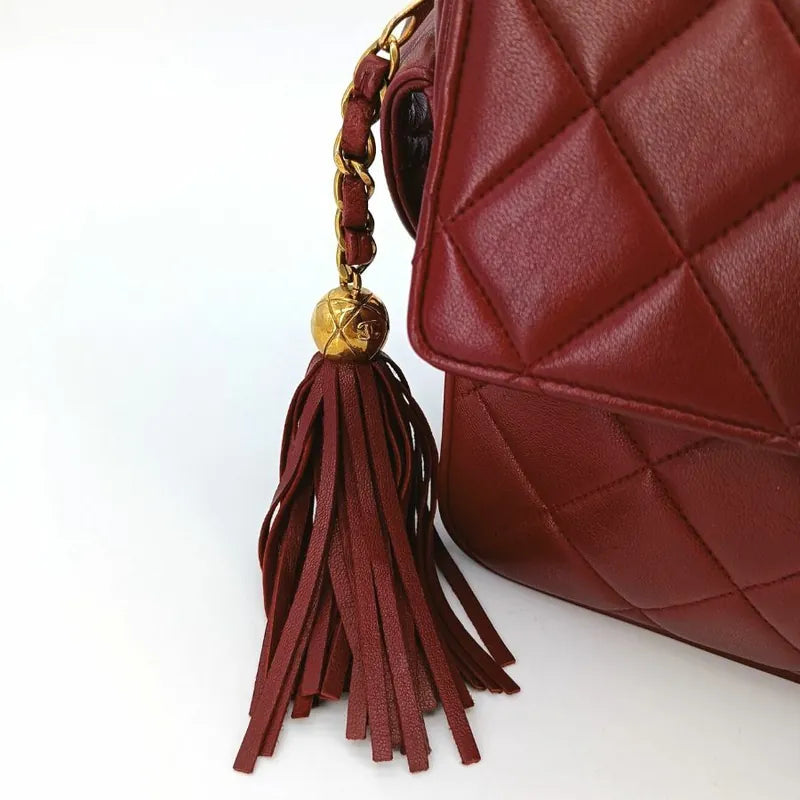 ra426-chanel-vintage-burgundy-lambskin-tessel-camera-bag