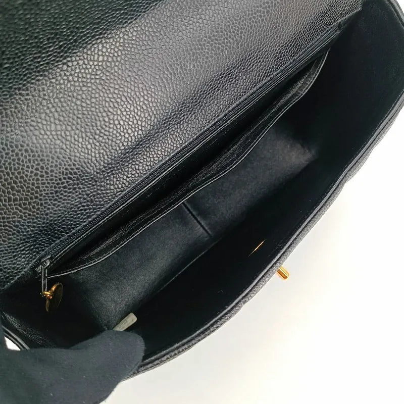 c361-chanel-vintage-black-caviar-leather-vertical-flap-handbag