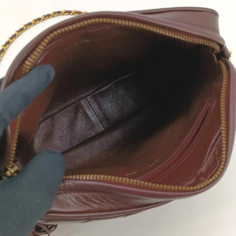 jt296-chanel-vintage-burgundy-lambskin-tassel-camera-bag