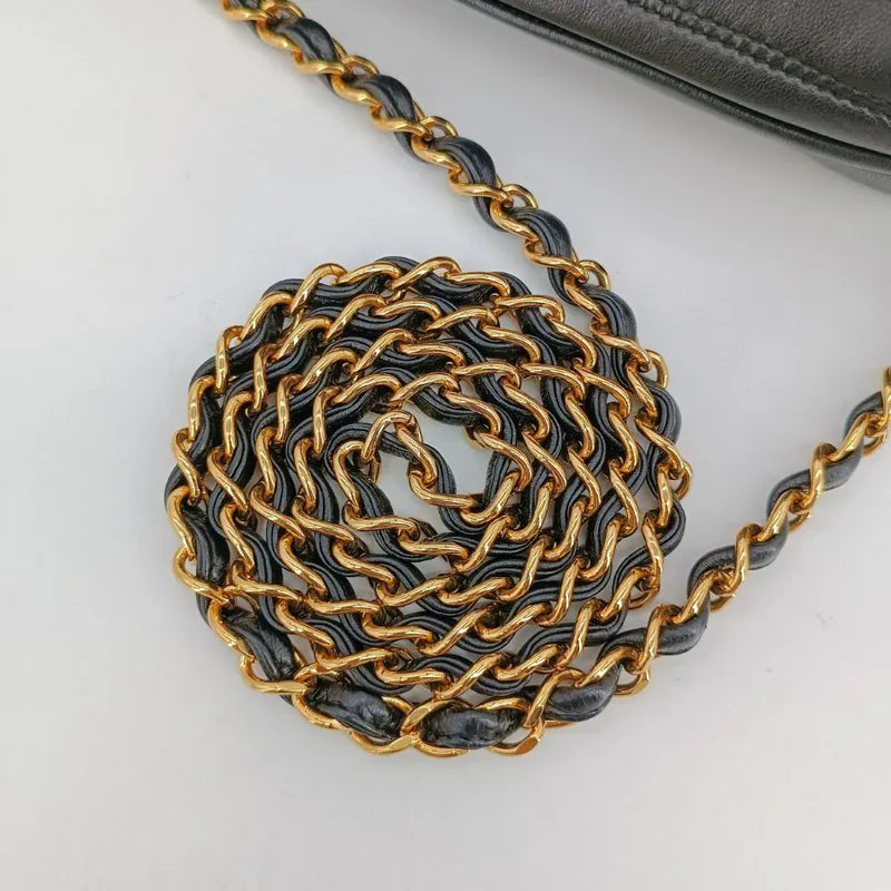 jt934-chanel-vintage-black-lambskin-quilted-camera-bag
