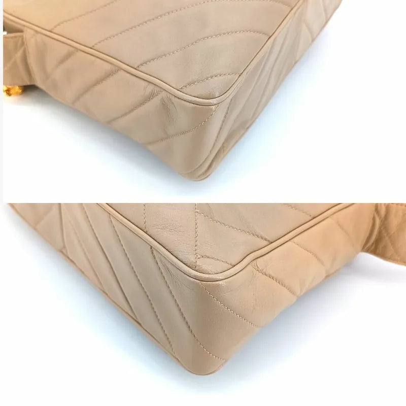 ra096-chanel-vintage-beige-lambskin-tessel-camera-bag