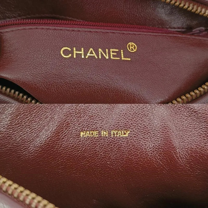 jt296-chanel-vintage-burgundy-lambskin-tassel-camera-bag