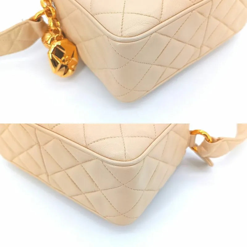 jt051-chanel-vintage-beige-lambskin-quilted-camera-bag
